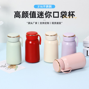 Bouteille d'eau isotherme en acier inoxydable 316 rose, mini-gobelet de voyage portable avec poignée et base en silicone, design rond - Product Image 2