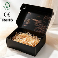 Caja de Cartón Corrugado Negra Mate Moderna para Envío de Productos de Alta Gama, Empaque de Regalo Premium con Estampado en Relieve y Recubrimiento UV