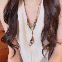 Collier en acrylique avec motif léopard dégradé en forme de cœur et géométrique - Chaîne de pull haut de gamme et unique