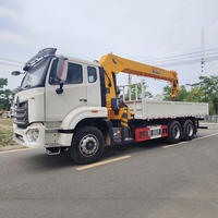 À vendre : Camions-grues lourds Sinotruk Howo de 12 et 14 tonnes. Exportation et personnalisation acceptées.