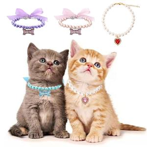 Arco desmontable gato collar diseños Rhinestone colgante <span class=keywords><strong>venta</strong></span> al por mayor accesorios para mascotas perla gato perro Collar para mascota pequeña - Product Image 1
