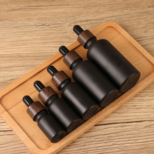 Botella de vidrio negro mate cilíndrica de lujo al por mayor de 5-100ml con gotero y collar de vidrio negro para aceite facial y <span class=keywords><strong>perfume</strong></span> - Product Image 5