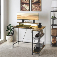 Bureau d'ordinateur portable en métal Addreen, facile à assembler, avec deux prises de courant et ports USB pour une recharge pratique de l'ordinateur portable