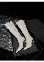 Bottes d'équitation d'hiver en cuir véritable à talon fin, à bout pointu et montantes jusqu'au genou