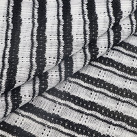 Tissu de vêtement en maille jacquard 100 % polyester 200 GSM pour la confection de robes