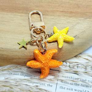 Version très demandée de porte-clés créatif en forme d'étoile de mer, accessoires pour voiture et sac, cadeaux promotionnels, pendentif marin micro-paysage - Product Image 4