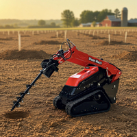 Mini-chargeuse sur chenilles équipée d'un tarière hydraulique, petit équipement de terrassement pour le forage agricole