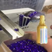 Machine d'emballage en aluminium pour confiseries en forme de bouteille imitation, entièrement automatique, personnalisable et à fonctionnement rapide