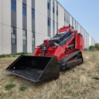 Chargeuse compacte sur chenilles Kubota avec moteur diesel et transmission, chenilles en caoutchouc, hauteur de déchargement de 2000 mm