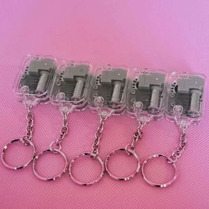 <b>Music</b> <b>Box</b> Pendant Necklace Creative Gift Acrylic Keychain Castle in the Sky Mini Rotate <b>Music</b> Keychains - Product Image 2