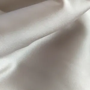 Bán Buôn Cổ Phiếu Cuối Cùng 100% Polyester Glinted Satin Lót Quần Áo Vải