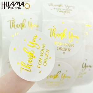 Etiqueta adhesiva transparente brillante con lámina dorada de Huamao Factory Direct para decoración de cajas de regalo. - Product Image 1