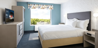 Meubles d'hôtel haut de gamme Home2 Suites by Hilton, canapé, table, ottoman pour projets hôteliers