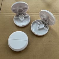 Boîte à pilules en plastique de pharmacie promotionnelle personnalisée en gros Mini coupe-pilule rond en plastique