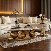 Table basse ovale de luxe moderne en marbre avec base sphérique en acier inoxydable, table de salon design pour villa et appartement