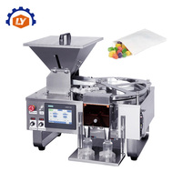 Machine de remplissage et de comptage automatique polyvalente pour bonbons gélifiés, chocolats et sucre