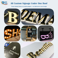 Enseigne rétroéclairée personnalisée, lettres en acier inoxydable peintes avec halo lumineux et supports, logo de devanture flottant et illuminé
