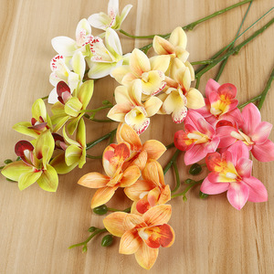 ดอกกล้วยไม้ฟาแลนนอปซิสประดิษฐ์จาก Yiwu Datuo ขนาด 10*35 ซม. สมจริง เหมาะสำหรับตกแต่งงานแต่งงาน สีขาวนม ฟ้าอมเขียว - Product Image 1