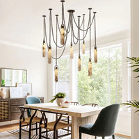 Derniers modèles de luminaires suspendus linéaires en métal et albâtre pour salon de villa, avec chaîne décorative et appliques murales