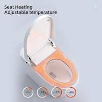 Toilette intelligente de luxe avec réservoir encastré, cuvette allongée, chasse d'eau automatique par capteur, siège chauffant, télécommande, toilette intelligente