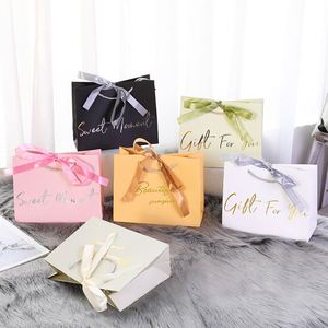ถุงกระดาษใส่ของขวัญสุดหรูพิมพ์ลายโลโก้ออกแบบได้ตามต้องการถุงกระดาษรักษ์โลกพร้อมที่จับริบบิ้นผูกโบว์ - Product Image 5