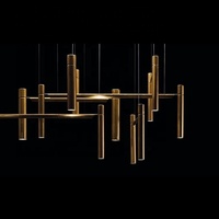 Lustre led de luxe 2024 nouvelle décoration combinée en métal linéaire led laiton tube lustre lumières pour salon salle à manger