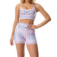 Ensemble de yoga imprimé floral/animal/à carreaux, short cycliste taille haute et brassière de sport, tenue de sport deux pièces avec logo frontal pour la gym et la course à pied