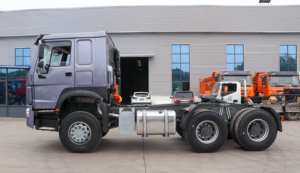 Camion tracteur HOWO-7 6X4 500HP Diesel <span class=keywords><strong>Euro</strong></span> <span class=keywords><strong>2</strong></span> d'occasion avec cabine à toit plat, climatisation et caméra arrière pour le transport d'engins - Product Image 5