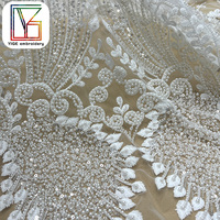 Luxe blanc mariée perlé paillettes dentelle français broderie fleur perle paillettes tissu Tulle dentelle tissu pour robe de mariée