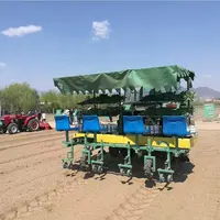Machine de repiquage sur chenilles à quatre lignes, pot de légumes moderne, semis efficace, équipement agricole, large gamme d'utilisations