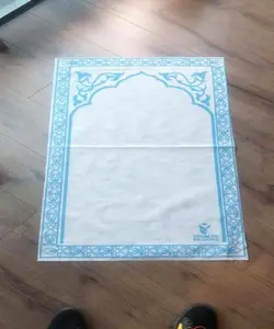 Wholesale cheapprinted paper fabric muslim styles logo printing foldable travel islamic pocket prayer mat/Portable prayer mat