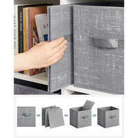 Boîtes de rangement grises pliables avec fond renforcé et doubles poignées pour l'organisation des placards et des étagères