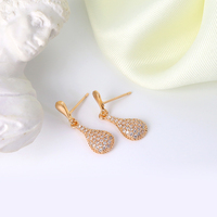 Vente en gros de boucles d'oreilles chandelier pendantes en diamant pavé de zirconium plaquées or blanc de luxe pour mariage