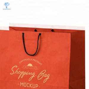 ถุงกระดาษคราฟท์สำหรับใส่เสื้อผ้าหรูหราแบบกำหนดเองพร้อมโลโก้ - Product Image 5