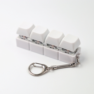 Llavero de Plástico con Teclado Fidget 4 en 1 con Luz, Impresión UV, Diseño de Dibujos Animados y Logotipo - Product Image 1