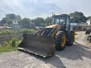 Chargeuse-pelleteuse JCB 4CX 4X14 d'occasion, 7000 kg, 2001-4000 heures, avec composants essentiels (moteur, pompe, boîte de vitesses, roulement) à vendre à bas prix - Product Image 2