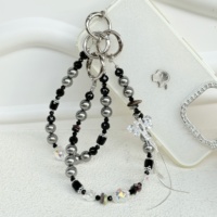 Chaîne de téléphone vintage noire et argentée perlée, longue sangle de téléphone à pampilles en cristal, ornement de sac à la mode pour femme, breloque de clé