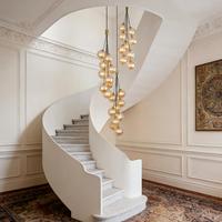 Lustre de luxe moderne en verre ambré à plusieurs têtes, en forme de globe, pour escalier en colimaçon, lampe suspendue longue verticale pour hall duplex, plafond haut, foyer