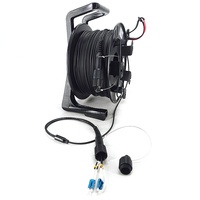 Bobine de câble à fibre optique tactique blindée rétractable portable avec prise de type européen, capacité de 100M-1000M, pour utilisation en télécommunications