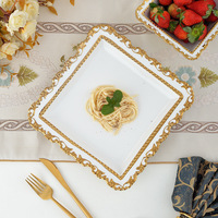 Service de table de luxe royal en céramique blanc or, assiettes de restaurant gaufrées, vaisselle en porcelaine incrustée d'or, vaisselle en stock