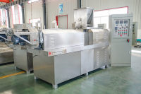 Ligne de production d'aliments secs extrudés pour chiens, machine de transformation d'aliments pour animaux de compagnie, extrudeuse de croquettes pour chats, équipement automatique de fabrication d'aliments pour animaux de compagnie