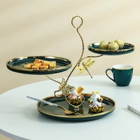 Assiette ronde moderne et simple à trois couches en céramique et porcelaine, incrustée d'or, écologique, pour fruits, pâtisseries et décorations.