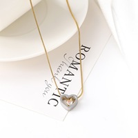 Collier Pendentif Soleil Vintage en Acier Inoxydable Doré, Bijou Unisexe avec Émail Noir, Collier Solaire Anti-ternissement pour Hommes et Femmes