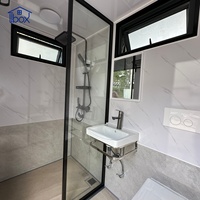 Toilettes portables modernes avec douche, cloison en verre et chauffe-eau pour camping-car, unité de salle de bain modulaire