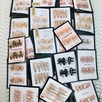 Vente en gros de faux ongles de luxe uniques à presser – Liquidation pour ongles réutilisables de haute qualité très populaires – Prix d'usine aléatoire pour les stands