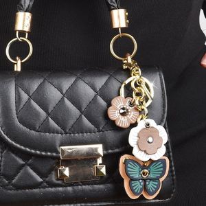 YY PU Leather Butterfly <b>Bag</b> <b>Charm</b> Wholesale Insect Theme Purse <b>Charm</b> Butterfly Keychain for Women <b>Bag</b> <b>Charms</b> - Product Image 1