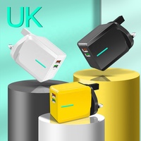 Chargeur mural intelligent 12W double USB Adaptateur d'alimentation de charge rapide 5V 2A avec prise EU US UK Chargeur universel de téléphone portable