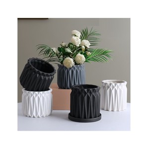 <span class=keywords><strong>Pot</strong></span> <span class=keywords><strong>de</strong></span> fleurs en ciment simple <span class=keywords><strong>de</strong></span> style nordique rond pour la décoration <span class=keywords><strong>de</strong></span> la maison - Product Image 1