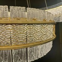 Grande suspension en cuivre de luxe moderne ronde en laiton couleur eau motif lustre en verre pour la décoration intérieure salon