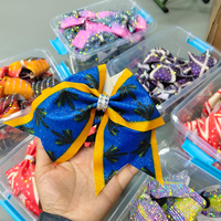 Vente en gros d'usine : Nœuds de cheerleading à paillettes et strass tendance, rubans en satin et accessoires pour cheveux